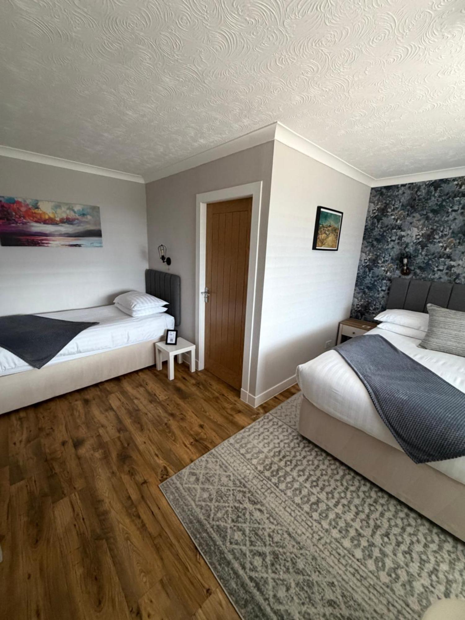 Deluxe Dreibettzimmer